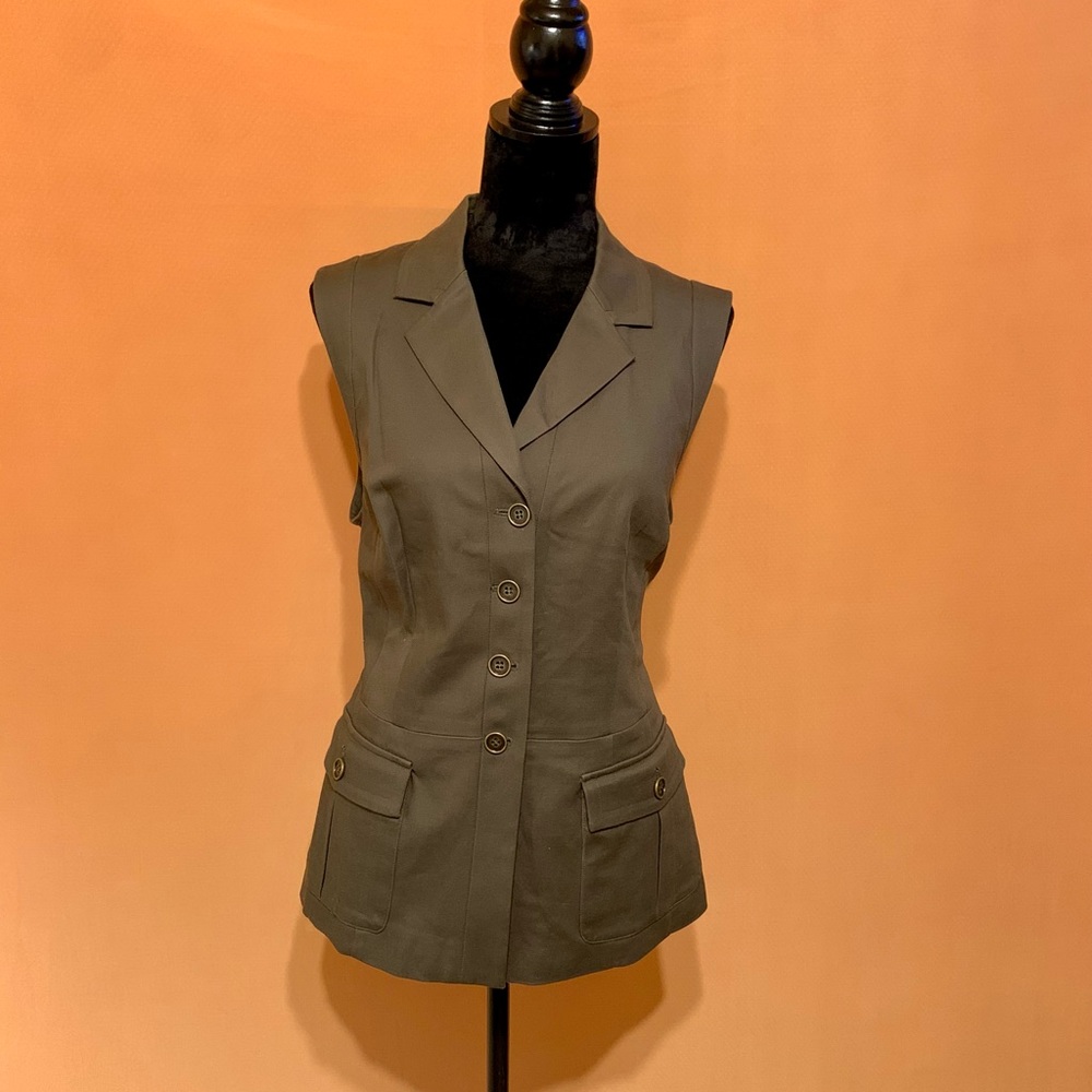 Army green button down this with pockets.